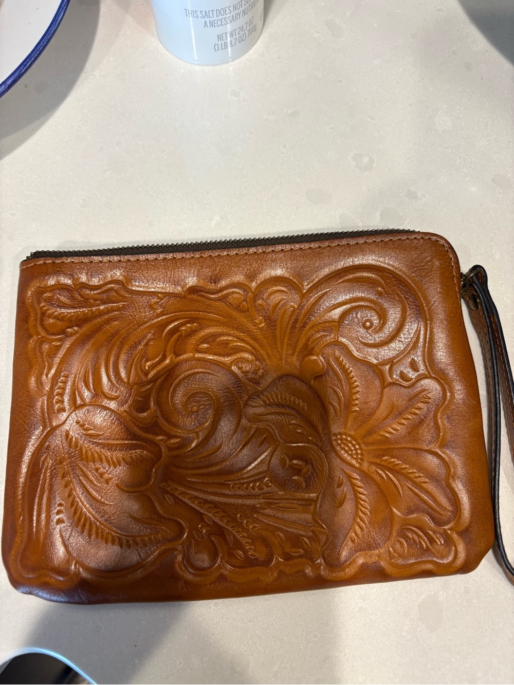 Embossed Leather Wristlet Clutch in Cognac Brown
